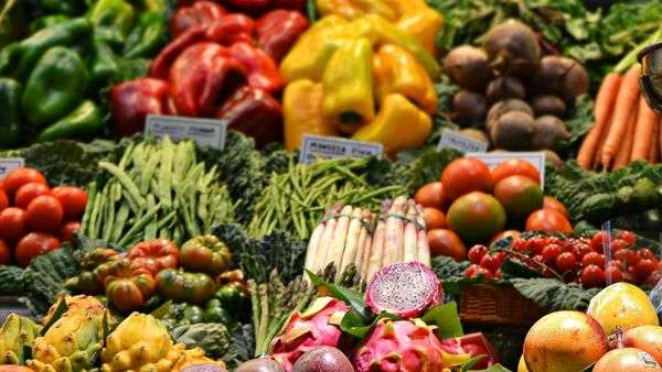 Colorful fresh vegetables displayed at a market stand